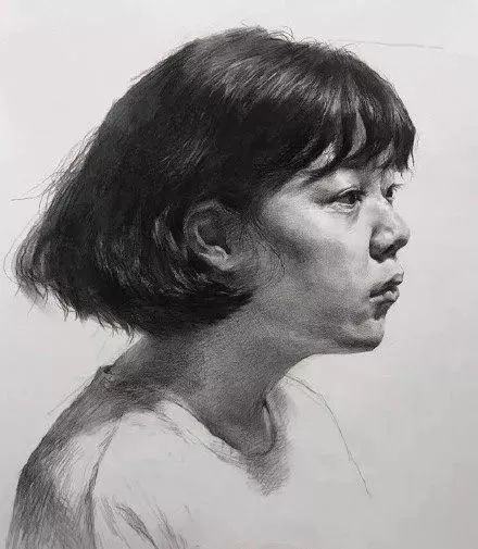 素描头像步骤图二分之一女青年侧面